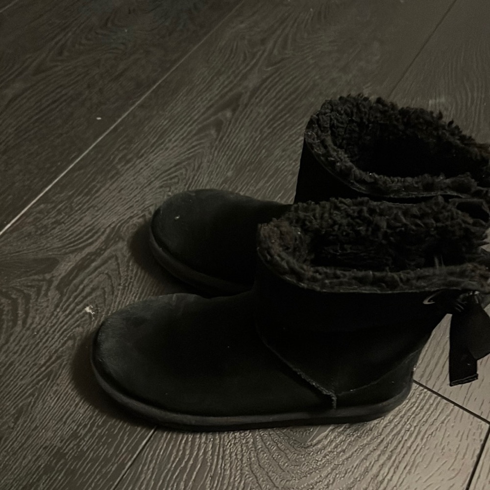 Big Girls size 4 black UGG kookaburra boots.  Super comfy.